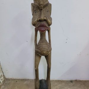 LOT 026: CARVED FIGURINE.